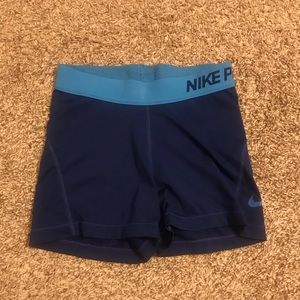 navy blue nike pros
